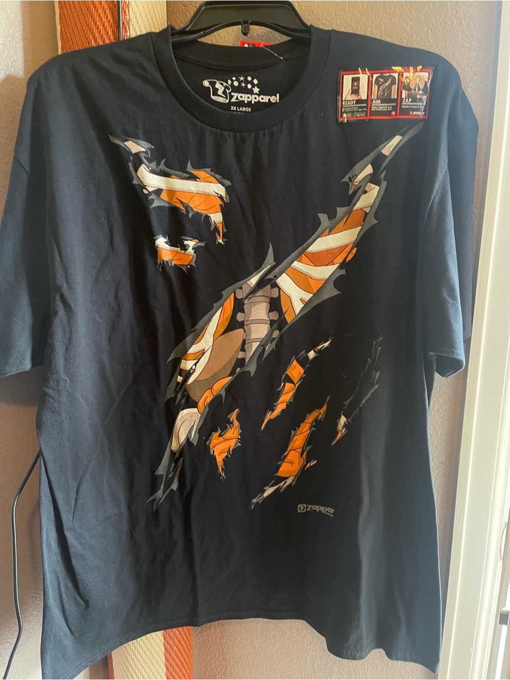 Men’s Black Graphic Tee with Orange Accent